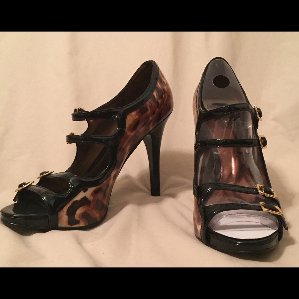 Carlos Santana black and leopard print heels